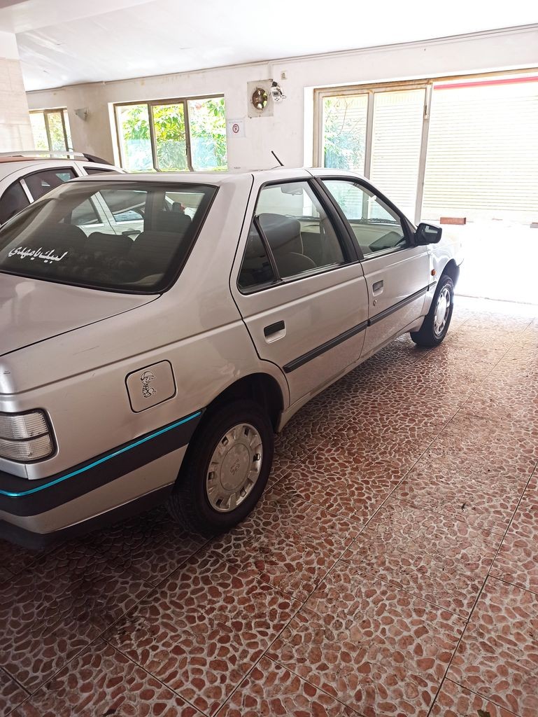 پژو 405نقره ای با دوتکه رنگ مدل 94 - تصویر 1