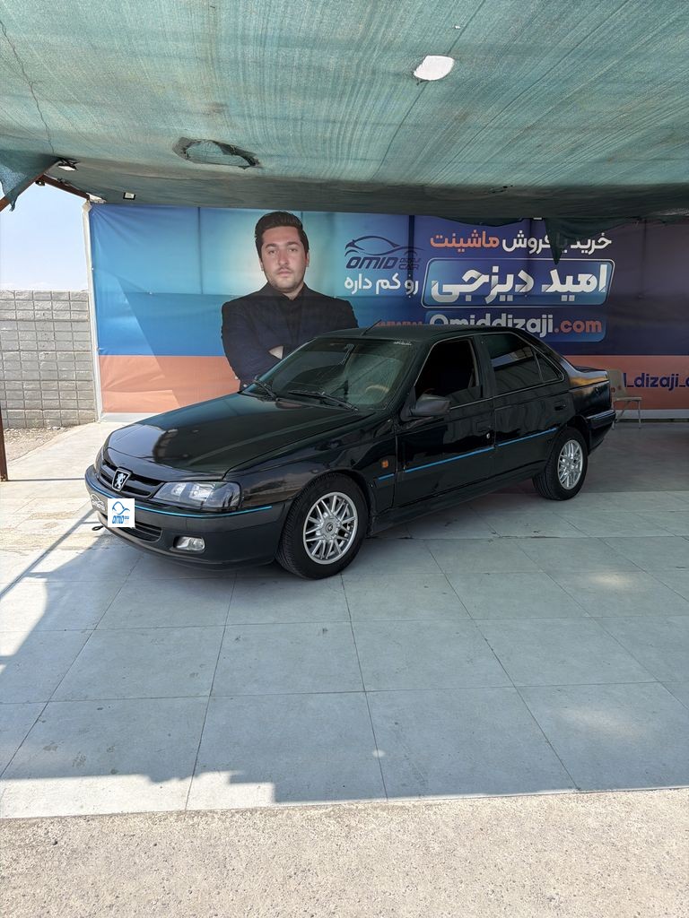 پژو پارس دوگانه دستی مدل 82 - تصویر 1